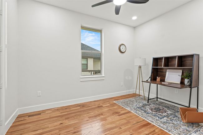 Office space featuring ceiling fan, wood finished floors, and recessed lighting | Image 23
