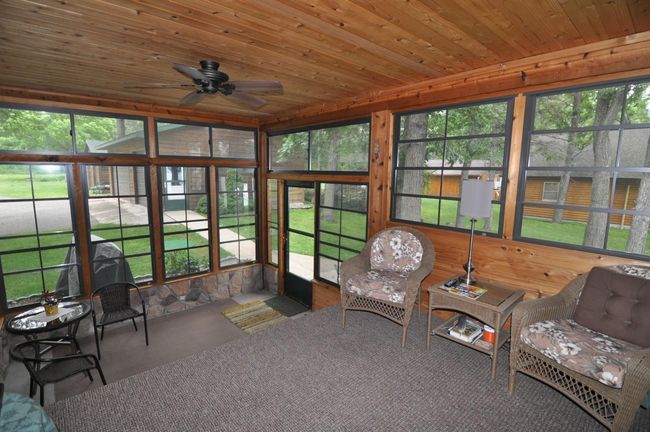3 Season Porch is loaded with windows. | Image 8