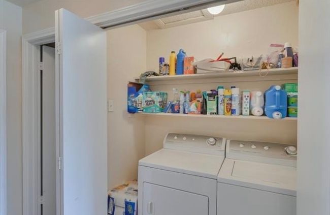 1st FL Laundry room featuring separate washer and dryer | Image 23