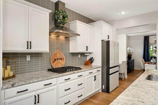 Note the beautiful stone counters and tile backsplash. | Image 18