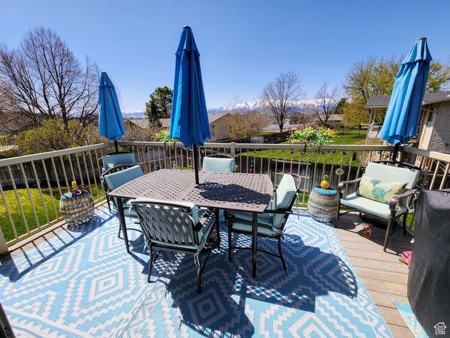 Wooden terrace with outdoor dining space | Image 17
