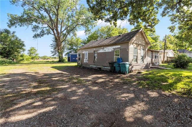 View of side of property with a lawn | Image 4