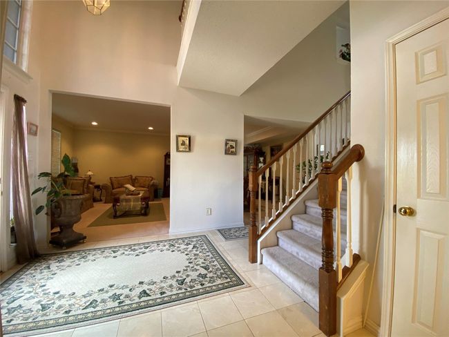 View of tiled entrance foyer | Image 6
