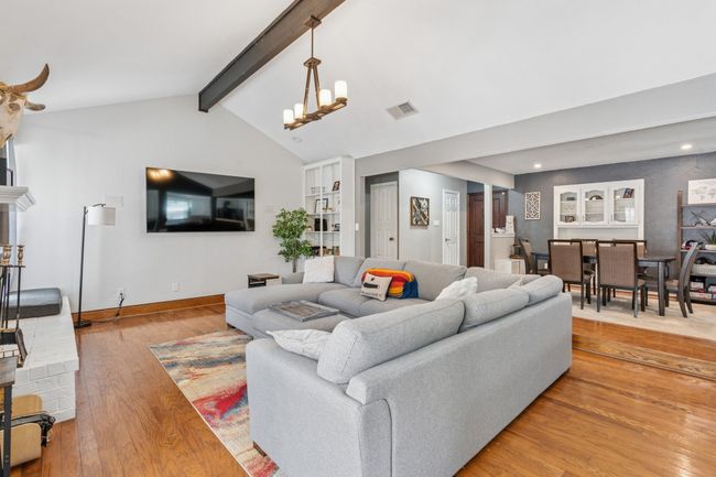 Step up to the formal dining room, large enough for an extended table! | Image 5