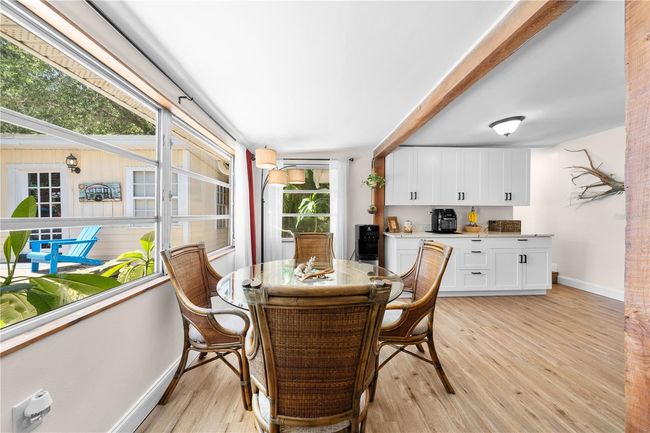 Main Home - Dinette overlooking the front yard. | Image 18