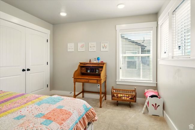 Bedroom featuring carpet floors and a closet | Image 14