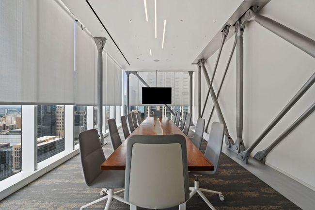 Dining space featuring a wall of windows | Image 35
