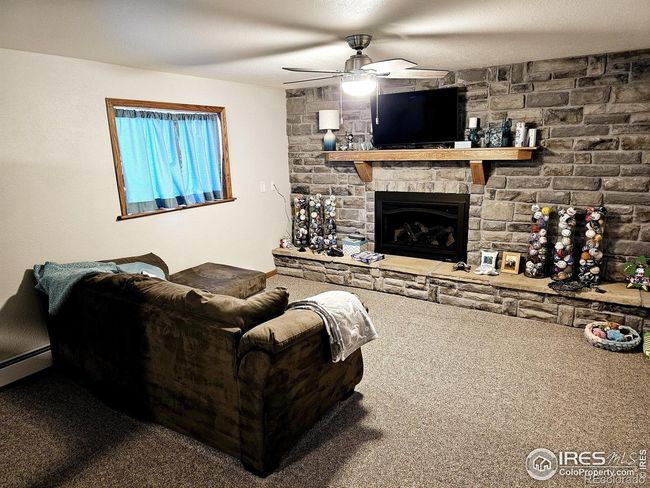 Family room with gas fireplace w/ remote | Image 17