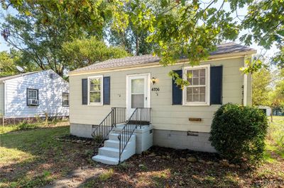 View of front of home with cooling unit | Image 2