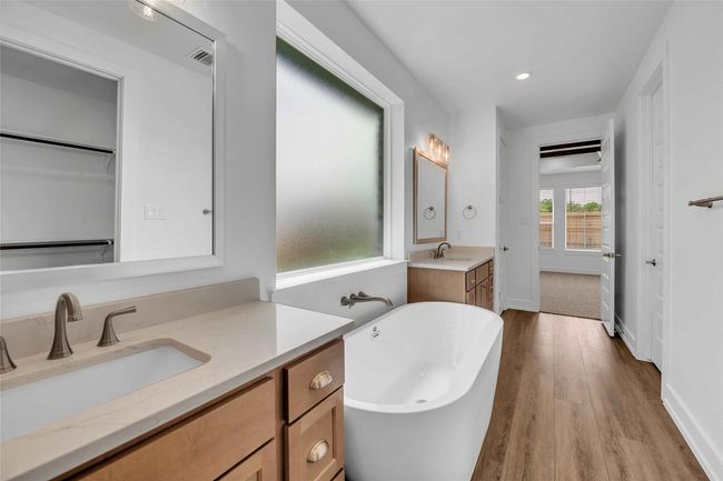 Please Note: These interior photos are not of the actual design, but are of a completed design with a similar floor plan. Finishes, features, and layouts may vary. | Image 12