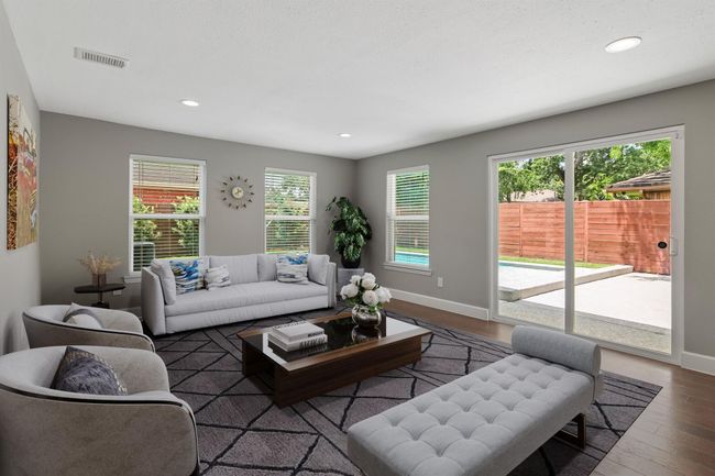 Virtually staged photo of family room. | Image 10