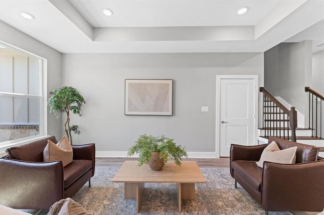 The heart of the home boasts an open layout with LED lighting throughout | Image 10