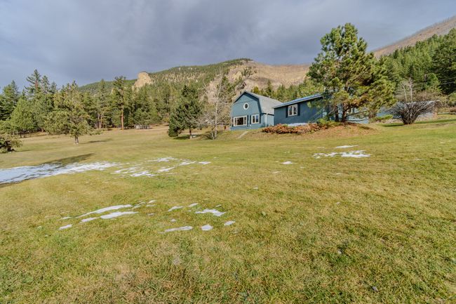 View of yard featuring a mountain view and a rural view | Image 74