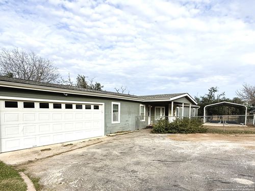 212 Thornton Ln, Lakehills, TX, 78063-4321 | Card Image