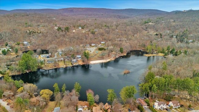 Bird's eye view featuring a water and mountain view and a wooded view | Image 35