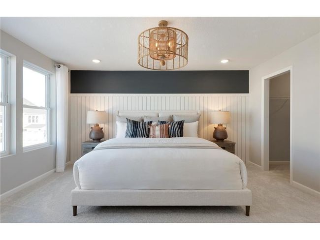 Welcome to the Primary Bedroom. The Ashton bedroom is a calming oasis and the perfect retreat at the end of the day! Photo of model home. | Image 31