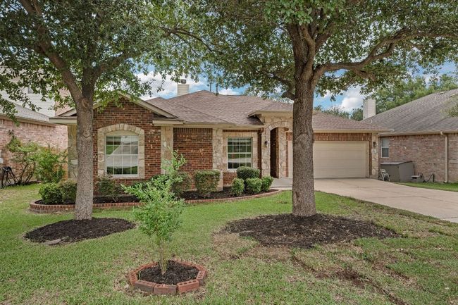 Enjoy Forest Oaks’ top-tier amenities including two pools (one with a waterslide, the other a junior Olympic lap pool), a clubhouse, 2.5-mile hike and bike trail, basketball court, playgrounds, and year-round community events. All this in an unbeatable Cedar Park location—walk to the elementary, middle, and high schools, and enjoy close proximity to shopping, dining, and major employers. Don’t miss your chance to own this exceptional home—schedule your private showing today! | Image 33