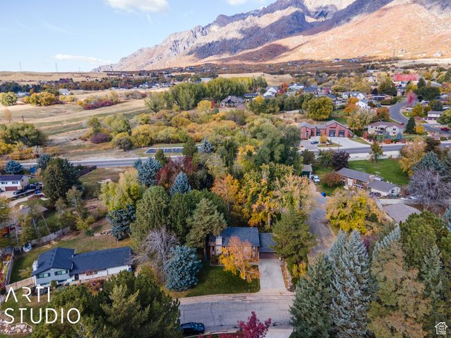 Aerial perspective of suburban area featuring a mountain backdrop | Image 56