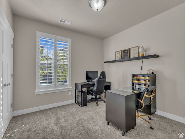 Carpeted office featuring baseboards | Image 15
