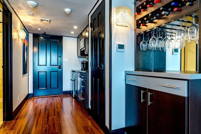 Custom built cabinetry and bar with wine rack | Image 6