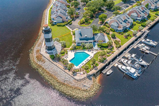 Drone / aerial view of a pool and a large body of water | Image 32