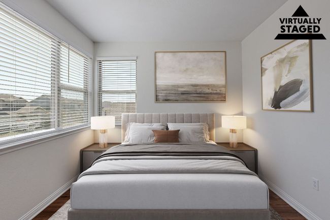 Bedroom with dark wood-style flooring and baseboards | Image 22
