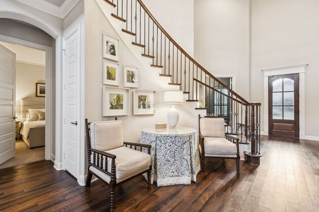 Elegant curved staircase foyer | Image 8