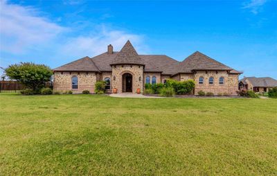 French country home with a front lawn | Image 3