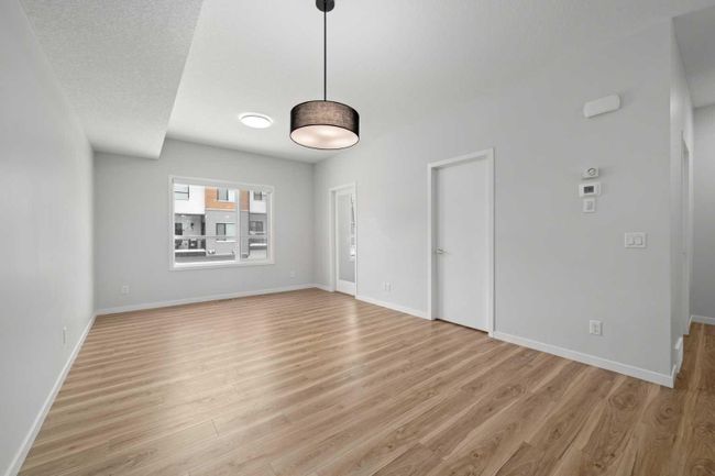 148 - 42 Cranbrook Gardens Se, Home with 3 bedrooms, 2 bathrooms and 4 parking in Calgary AB | Image 6