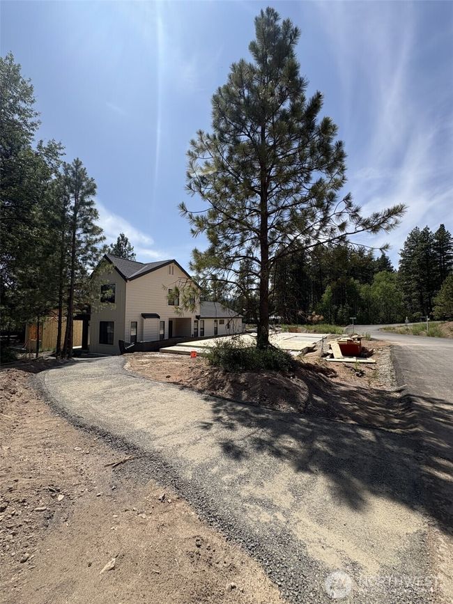 As the newest PNW master-planned community, enjoy 200+ acres of open space, trails & the Coal Trax Mt Bike Park. Soaring ceilings in the great roommake each day worthy of celebration & open floorplan appeals to entertaining. Covered deck & patio. Southern-facing homesites range from the mid600s- 900ks. Enjoy a variety of innovative & distinctive new home options with the best all-season recreation just moments away! Built for the future, indulge in a retreat just 90-min to Seattle. Plans and elevations are artist’s renderings only, may not accurately represent the actual condition of a home asconstructed and may also contain options and upgrades which are not included in the sale. Trailside Homes reserves the right to make changes to the floorplan, specifications, dimensions, design and elevations without prior notice. Stated dimensions and square footage are estimated and should not be usedas representations of the home’s actual size. | Image 6
