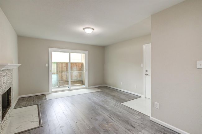 Another view of the living room. | Image 7