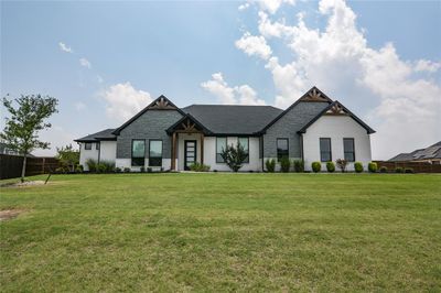 View of front of home featuring a front yard | Image 1