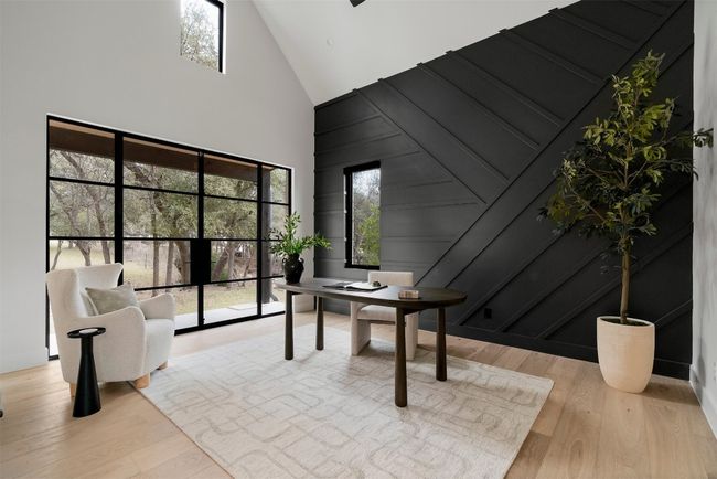 The office, wrapped in matching steel doors, serves as an inspiring space bathed in natural light | Image 4