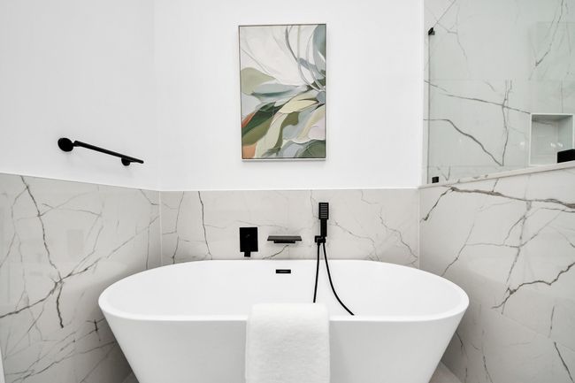 The freestanding tub is perfect for relaxing! | Image 18