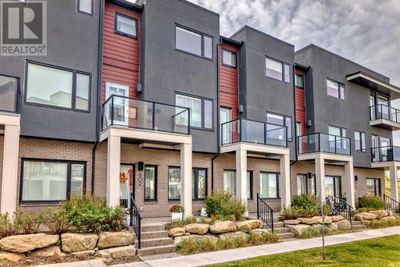 218 Sherwood Sq Nw, Townhouse with 3 bedrooms, 3 bathrooms and 2 parking in Calgary AB | Image 2