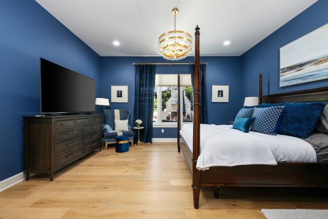 Private primary suite with backyard views. | Image 12