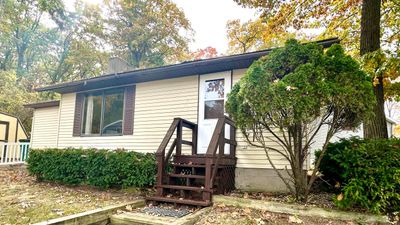 16858 Ne Shawano Drive Ne, House other with 1 bedrooms, 1 bathrooms and null parking in Sand Lake MI | Image 1