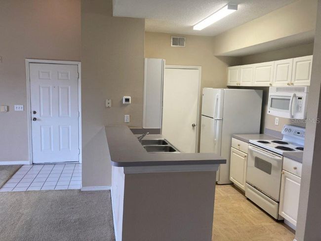 APT-307 - 5530 Metrowest Blvd, Condo with 2 bedrooms, 1 bathrooms and null parking in Orlando FL | Image 4