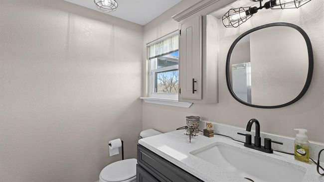 Half bath with toilet and vanity | Image 45