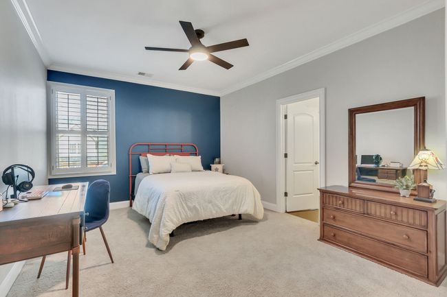 Upstairs, you'll find three more bedrooms! This bedroom has bathroom access & a double closet. | Image 38
