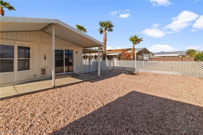 View of yard with a patio and fence | Image 40