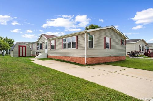 885 Tanners Lndg, Raisinville Twp, MI, 48161-4588 | Card Image