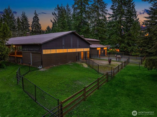 Paddocks with access to stalls and pastures. | Image 6
