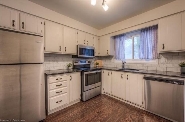 7 - 206 Green Valley Dr, Townhouse with 3 bedrooms, 2 bathrooms and 1 parking in Kitchener ON | Image 13