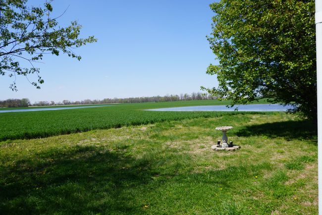 During really heavy rains the farm fields hold a little water and it looks semi-lakefront & is gorgeous, but it has never gotten near the house. | Image 38
