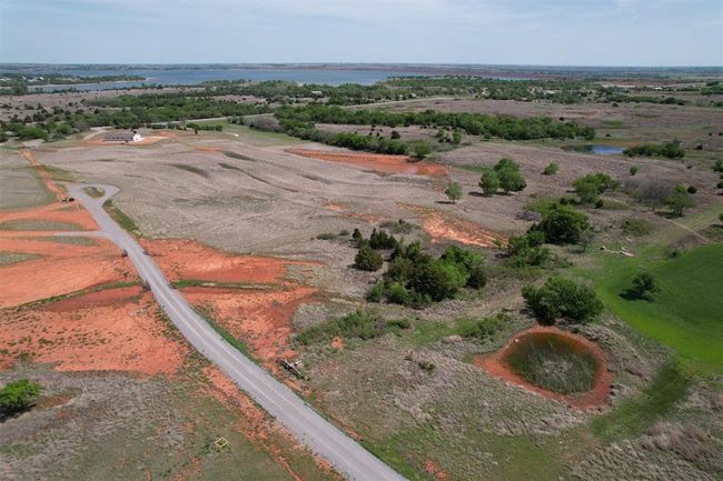 Aerial overview of property's location with a large body of water | Image 4