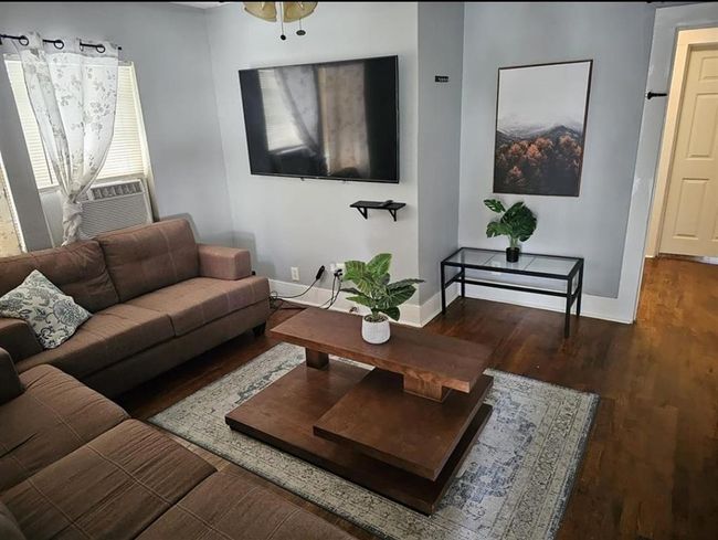 Living room in two bedroom unit. | Image 10