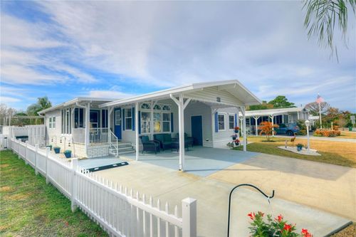 809 Lychee Dr, Barefoot Bay, FL, 32976-2573 | Card Image