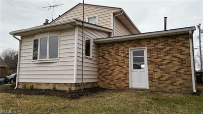 Rear view of house featuring a yard | Image 3