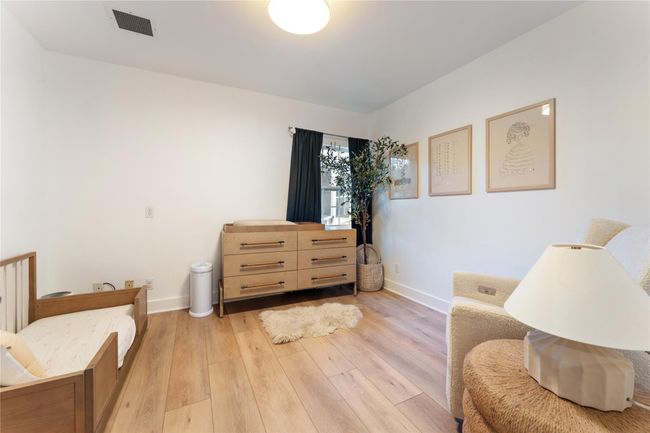 This third bedroom currently used as a nursery | Image 19